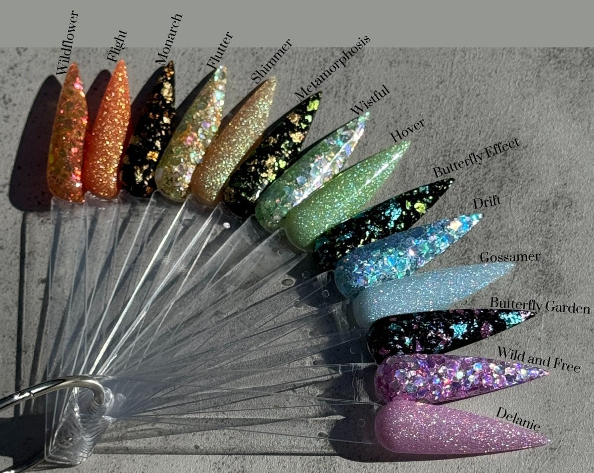 Photo shows swatch of Dipnotic Nails Wistful Pastel Green Holographic Nail Dip Powder The Butterfly Effect Collection