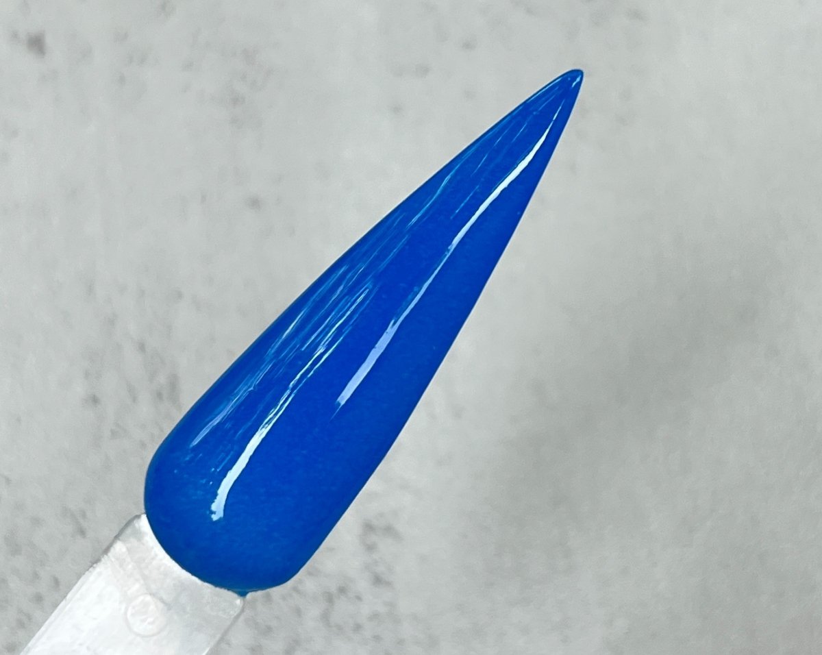 Photo shows swatch of Dipnotic Nails Xenon Neon Blue Nail Dip Powder- The Neon Collection